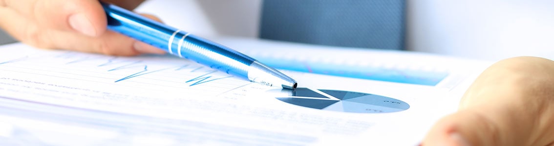 Man pointing to graphs